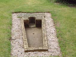 38 Stone coffin in chancel.jpg (16569 bytes)